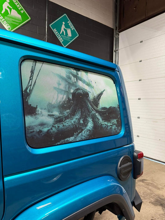 Rear quarter window see through graphic. Kraken decal